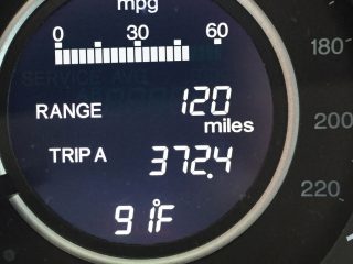 Image of a instrument cluster on a 2013 CR-V getting 38 MPG